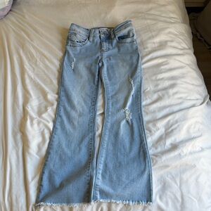 Women's Light Blue Distressed Jeans